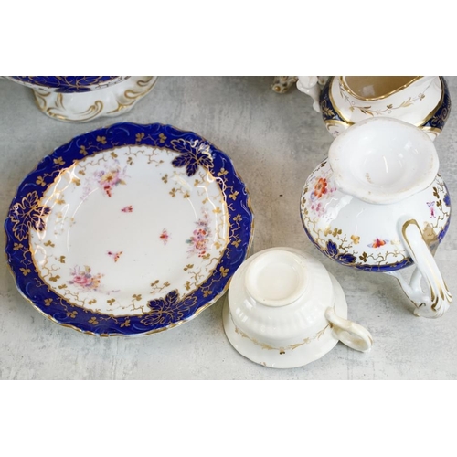 92 - 19th century tea ware with floral decoration & cobalt blue glazing on a white ground, to include tea... 