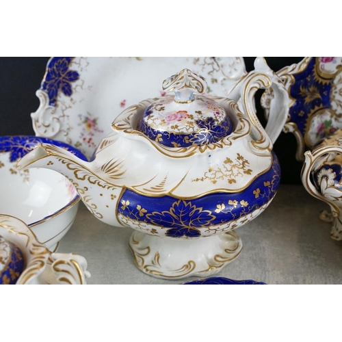 92 - 19th century tea ware with floral decoration & cobalt blue glazing on a white ground, to include tea... 