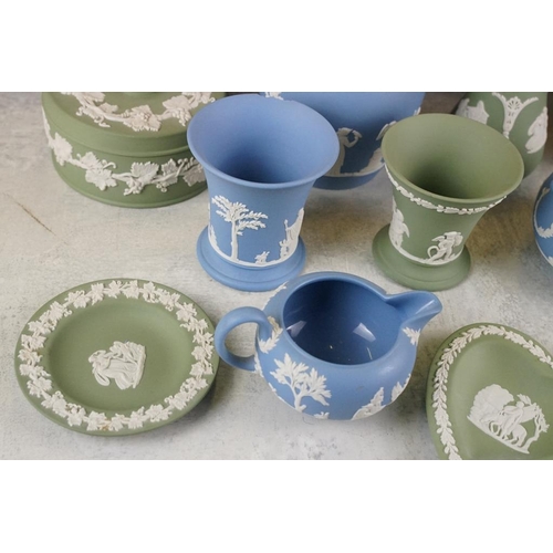 95 - Collection of Wedgwood Jasperware, in pale blue & green, to include teapots, jug, sugar basin, vases... 