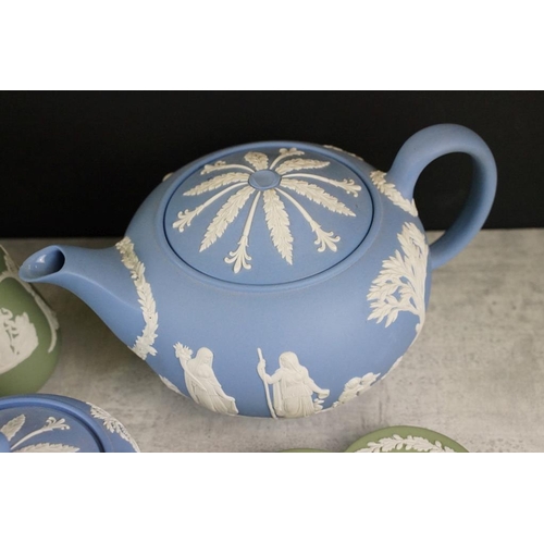 95 - Collection of Wedgwood Jasperware, in pale blue & green, to include teapots, jug, sugar basin, vases... 