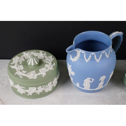 95 - Collection of Wedgwood Jasperware, in pale blue & green, to include teapots, jug, sugar basin, vases... 