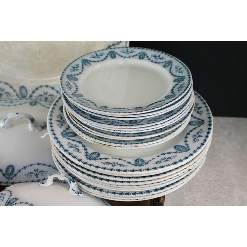 97 - Pountney & Bristol ltd Bath Pattern dinner service to include serving platters, dinner plates, turee... 