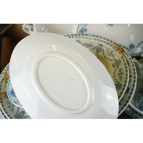 97 - Pountney & Bristol ltd Bath Pattern dinner service to include serving platters, dinner plates, turee... 