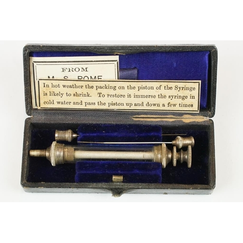 222 - A small group of mixed collectables to include a pocket syringe, vesta cases and snuff boxes.