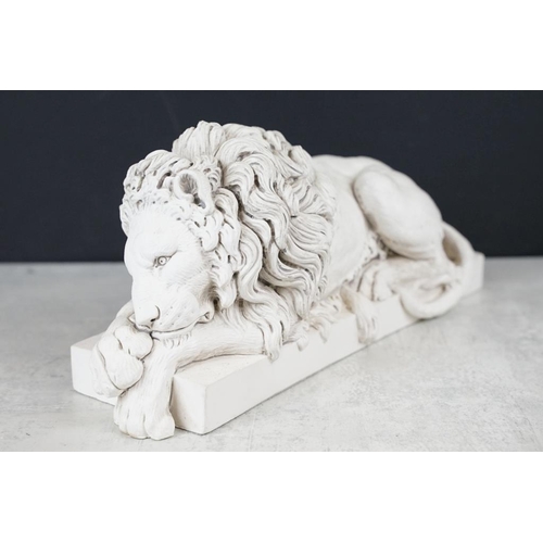 428 - After Antonia Canova (1757-1822) - A reconstituted stone washed figure of a lion (32cm long), togeth... 