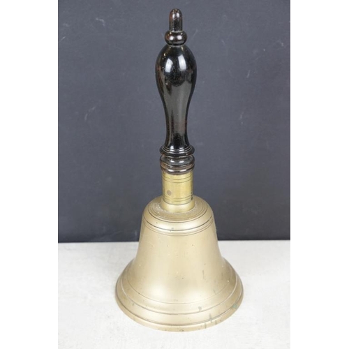 429 - Group of mixed collectables to include a brass school bell with turned wooden handle (26.5cm high), ... 