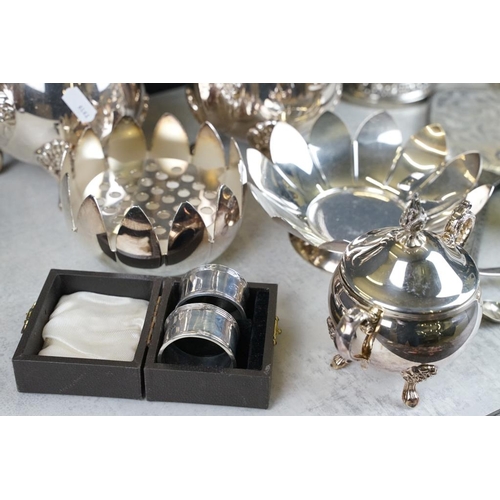 433 - Mixed silver plate to include a Viners four-piece tea set, candlestick, rose bowl, etc, plus a cased... 