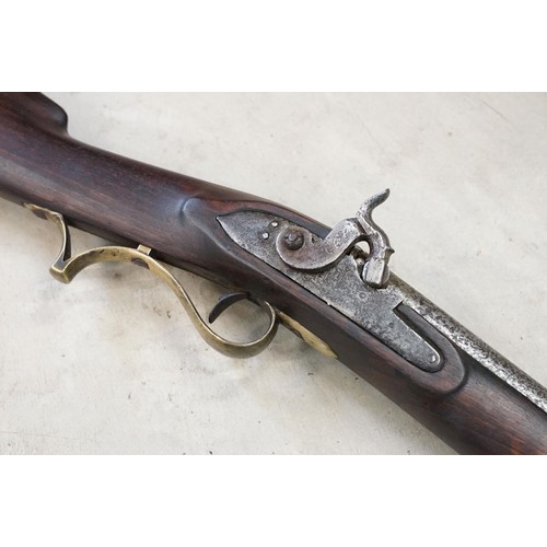 232 - Percussion cap muzzle loading rifle with short barrel and brass fittings, plus a shotgun case