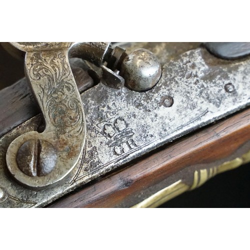 233 - Percussion cap muzzle loading rifle with long barrel and brass fittings, engraved with GR cypher