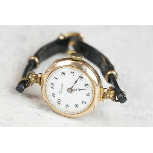 575 - 9ct gold cased ladies watch, white enamel dial, black Arabic numerals, poker hands, diameter approx ... 