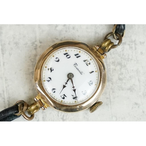 575 - 9ct gold cased ladies watch, white enamel dial, black Arabic numerals, poker hands, diameter approx ... 