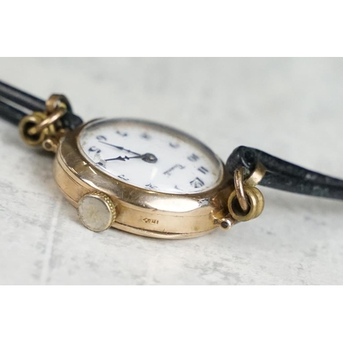 575 - 9ct gold cased ladies watch, white enamel dial, black Arabic numerals, poker hands, diameter approx ... 