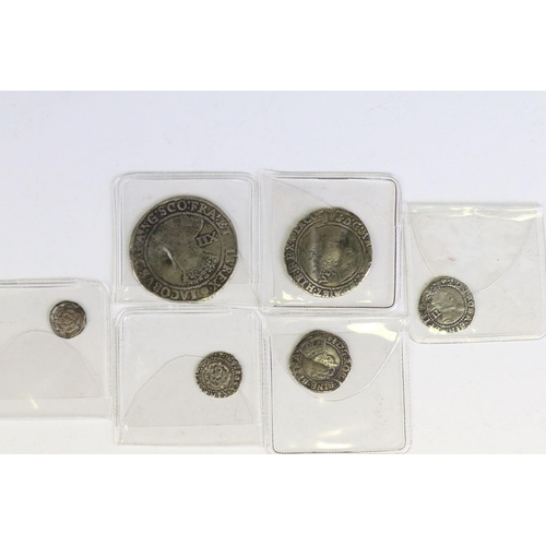 273 - A collection of six British King James I hammered silver coins to include a shilling, sixpence, 2 x ... 