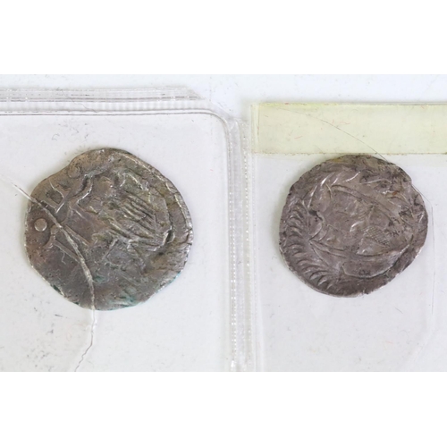 275 - Two British Oliver Cromwell hammered silver coins to include a half groat and a one penny example. (... 