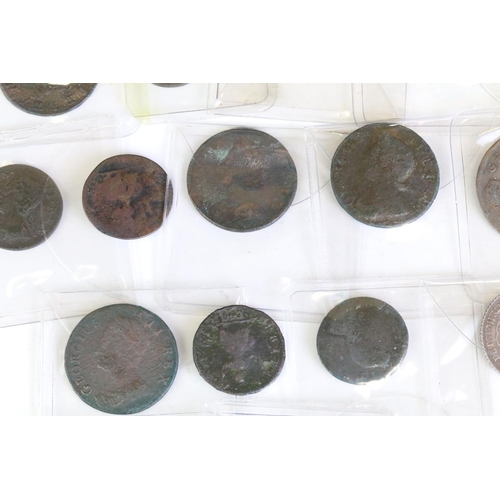 286 - A collection of nineteen King George II early milled silver and copper coins to include sixpence, sh... 