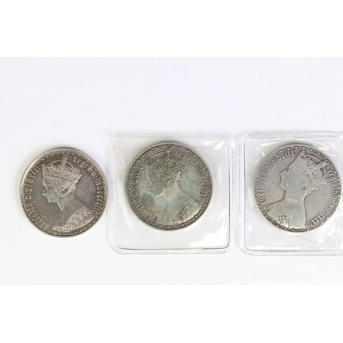 296 - A collection of three British Queen Victoria silver Gothic florins to include 1880, 1885 and 1853 ex... 