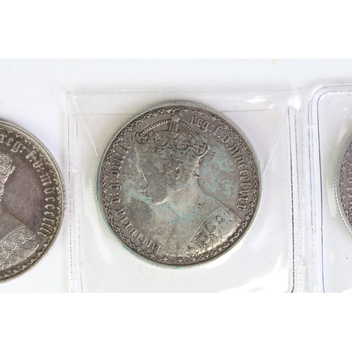 296 - A collection of three British Queen Victoria silver Gothic florins to include 1880, 1885 and 1853 ex... 