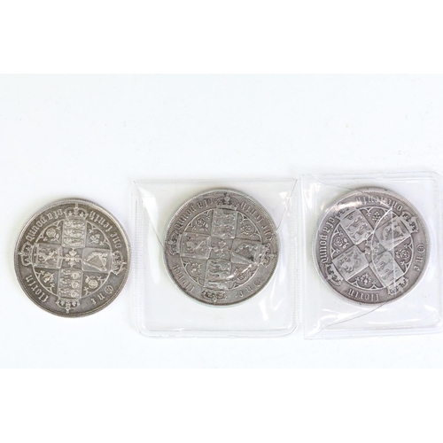 296 - A collection of three British Queen Victoria silver Gothic florins to include 1880, 1885 and 1853 ex... 