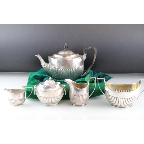 816 - Silver three piece tea service comprising teapot, twin handled sugar bowl and milk jug, gadrooning t... 