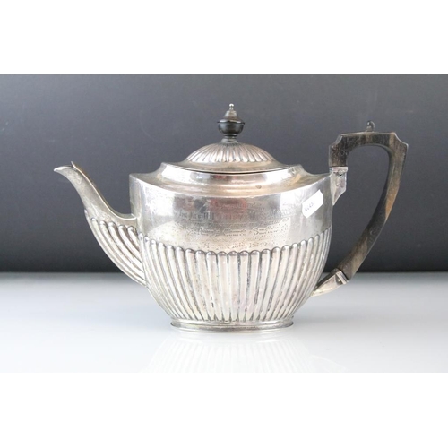 816 - Silver three piece tea service comprising teapot, twin handled sugar bowl and milk jug, gadrooning t... 