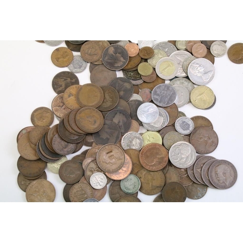 238 - A collection of British and World coins to include a quantity of pre decimal silver examples,