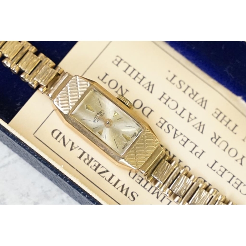 571 - Rotary 9ct gold cased wristwatch, champagne rectangular dial, gold-coloured baton numeral markers, 9... 