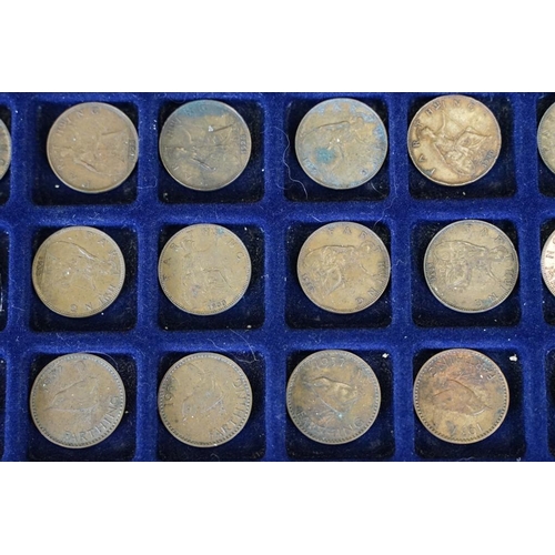 240 - A collection of British pre decimal copper farthing coins to include Queen Victoria and King George ... 