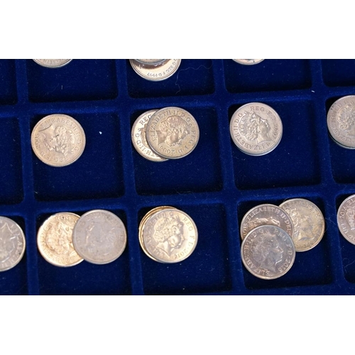 241 - A collection of British decimal coinage to include 1/2p, 1p and 2p examples contained within an alum... 