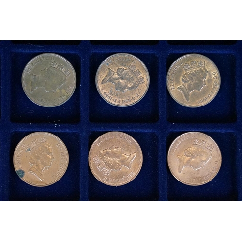 241 - A collection of British decimal coinage to include 1/2p, 1p and 2p examples contained within an alum... 