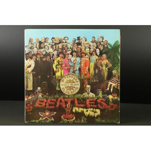 4 - Vinyl - The Beatles Sgt. Pepper's Lonely Hearts Club Band. UK Original mono pressing with pink flame... 