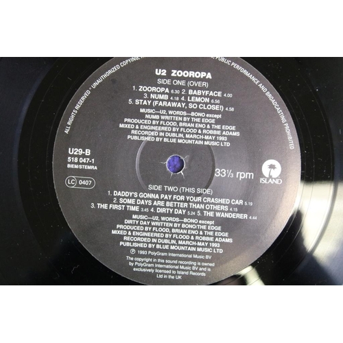 441 - Vinyl - one album and one 12” by U2 to include: Zooropa (UK 1993 1st pressing with printed inner and... 