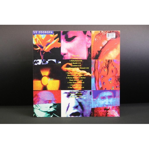 441 - Vinyl - one album and one 12” by U2 to include: Zooropa (UK 1993 1st pressing with printed inner and... 