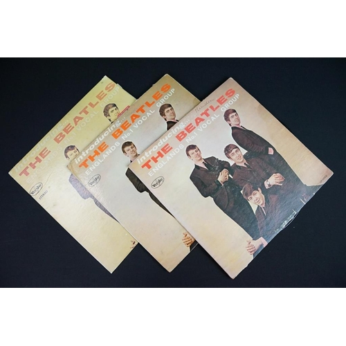 225 - Vinyl - 6 copies of Introducing The Beatles LP on Vee-Jay.  Condition varies, one sealed.