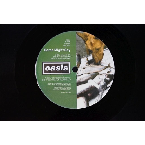 402 - Vinyl - two original 12” singles and 2 original 7” singles by Oasis to include: Whatever (UK 1st Dam... 