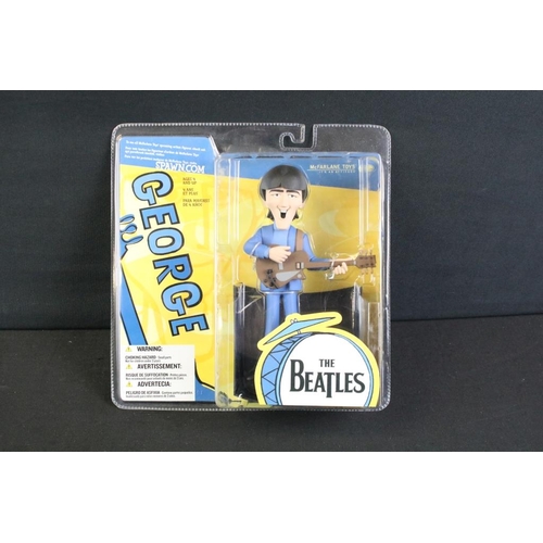 733 - Memorabilia - The Beatles, 2004 deluxe set of all 4 figures with instruments and stage, unopened in ... 