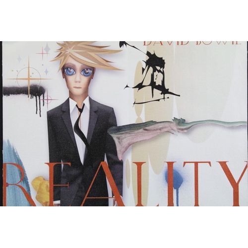 738 - Memorabilia - David Bowie ‘Reality’ promotional print on canvas, unframed and unmounted, 2003.