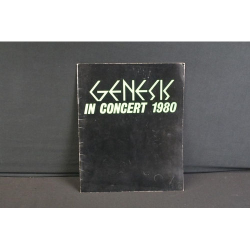 744 - Memorabilia - Genesis 1980 tour items to include padded gilet, scarf and tour programme.