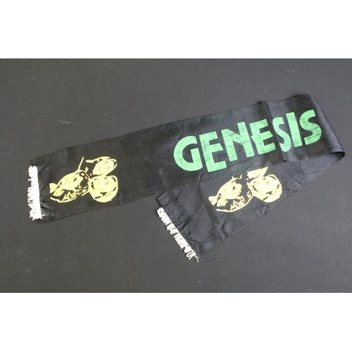 744 - Memorabilia - Genesis 1980 tour items to include padded gilet, scarf and tour programme.