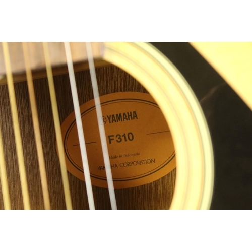 776 - Guitar - Yamaha F310 acoustic guitar, with stand