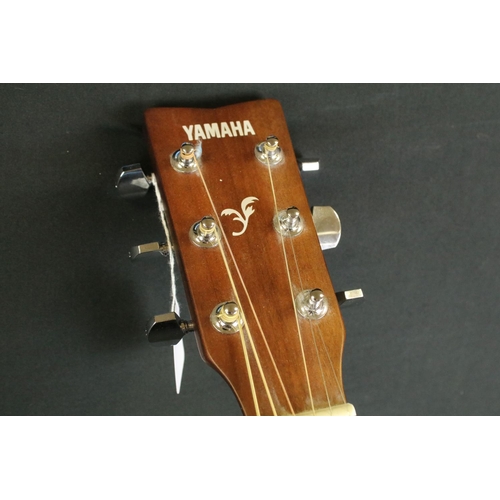 776 - Guitar - Yamaha F310 acoustic guitar, with stand