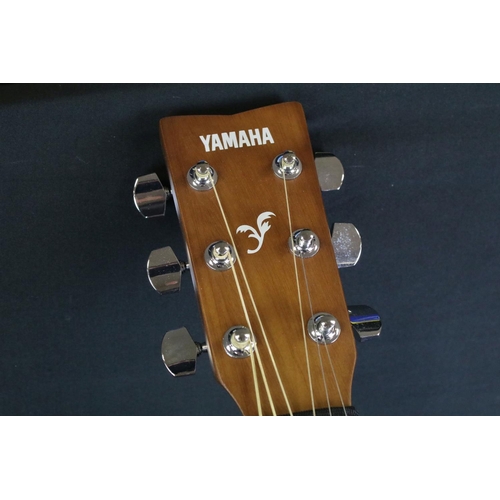 777 - Guitar - Yamaha F310 acoustic guitar with a good Yamaha soft case and strap