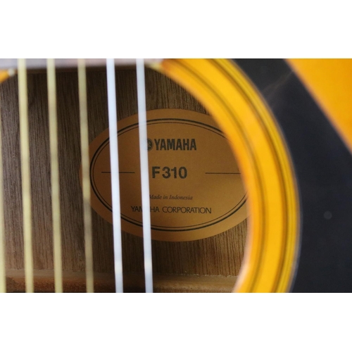 777 - Guitar - Yamaha F310 acoustic guitar with a good Yamaha soft case and strap