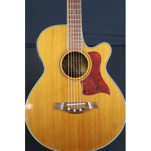 781 - Guitar - Tanglewood TW45DLX electro acoustic guitar, a couple of marks to body, with soft case