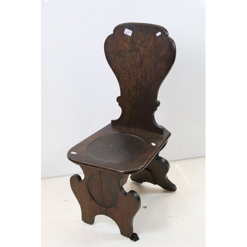 697 - 19th century Oak Hall Chair with shaped plain back and solid seat and two shaped panel supports, 91c... 