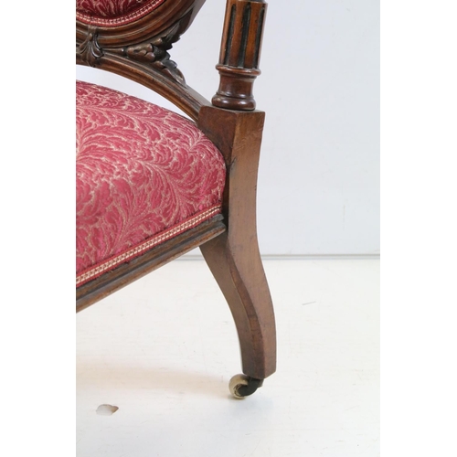 698 - Edwardian Mahogany Nursing Chair, the oval upholstered splat with ribbon carving, upholstered stuff-... 