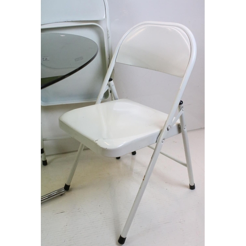 678 - Set of Four Mid century / Contemporary ' Krueger ' Metal Folding Chairs with a white finish, each ch... 