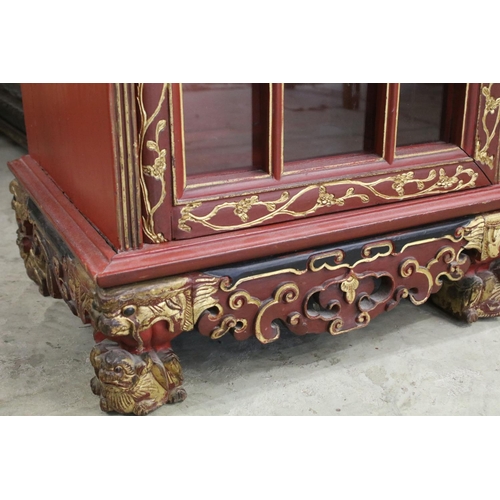 693 - Red Lacquered and Gilt decorated Inverted Breakfront Display Cabinet in the Chinese manner, the cent... 