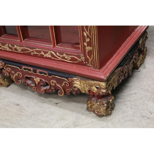 693 - Red Lacquered and Gilt decorated Inverted Breakfront Display Cabinet in the Chinese manner, the cent... 