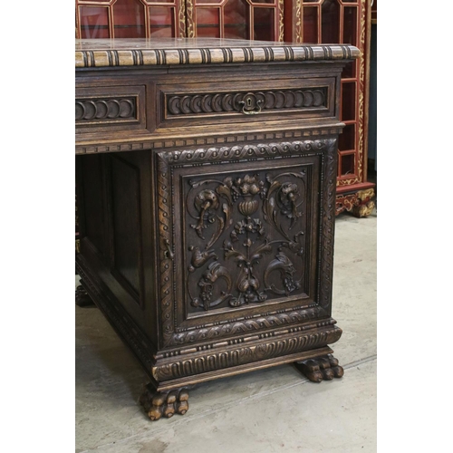 705 - 19th century Dark Oak Twin Pedestal Desk with three carved front drawers, each pedestal with heavily... 