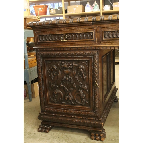 705 - 19th century Dark Oak Twin Pedestal Desk with three carved front drawers, each pedestal with heavily... 